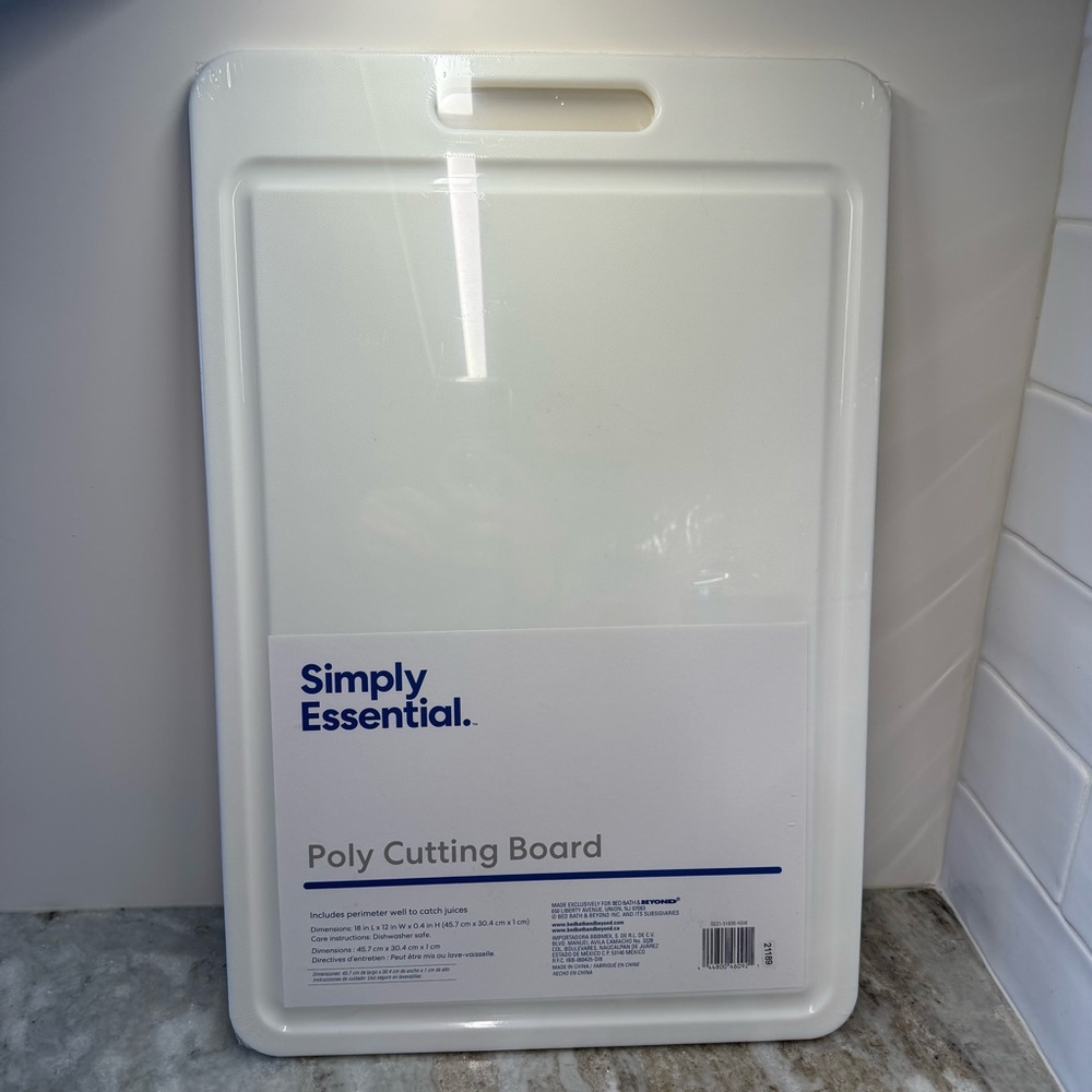 NEW! Made exclusively for BedBath & Beyond. Simply Essential White Cutting Board